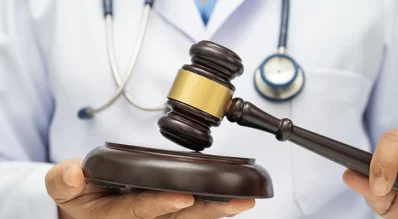 Who can be sued under medical malpractice laws?