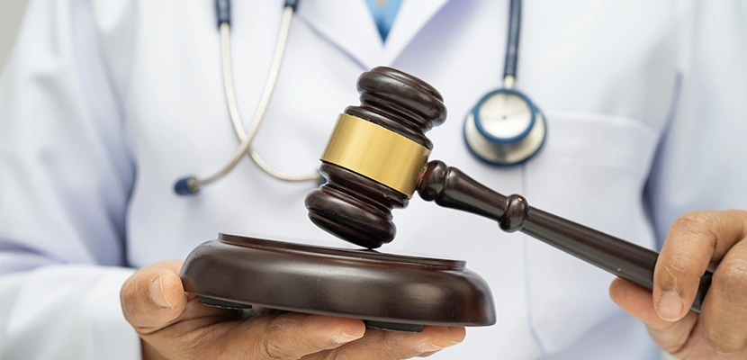 Who can be sued under medical malpractice laws?